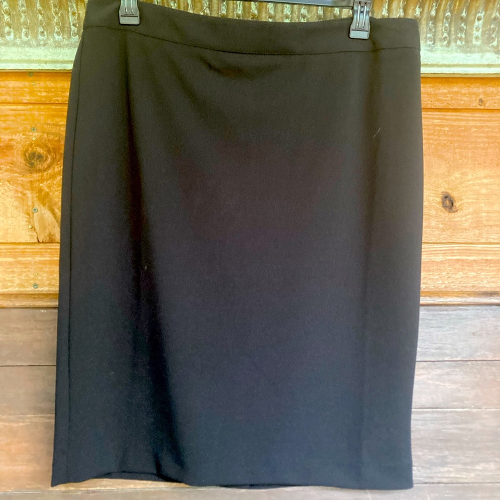 DKNY black elegant size 14 skirt with beautiful gold embellishment and brand new